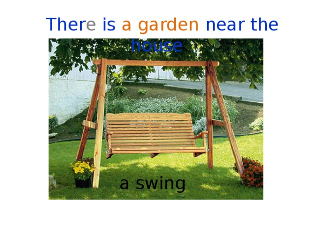 Ther e is a garden near the house . a swing 