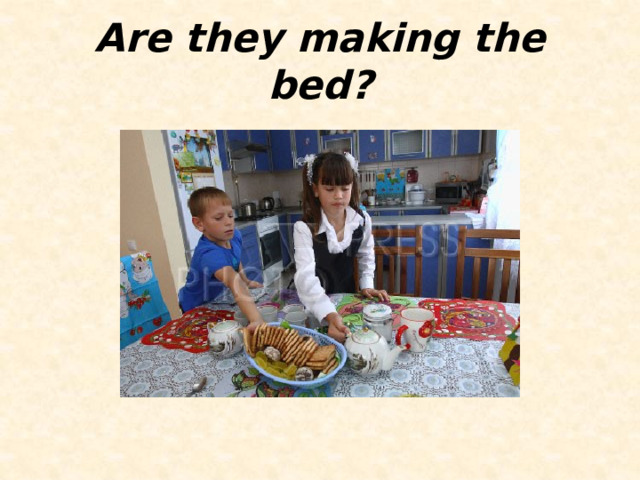 Are they making the bed? 